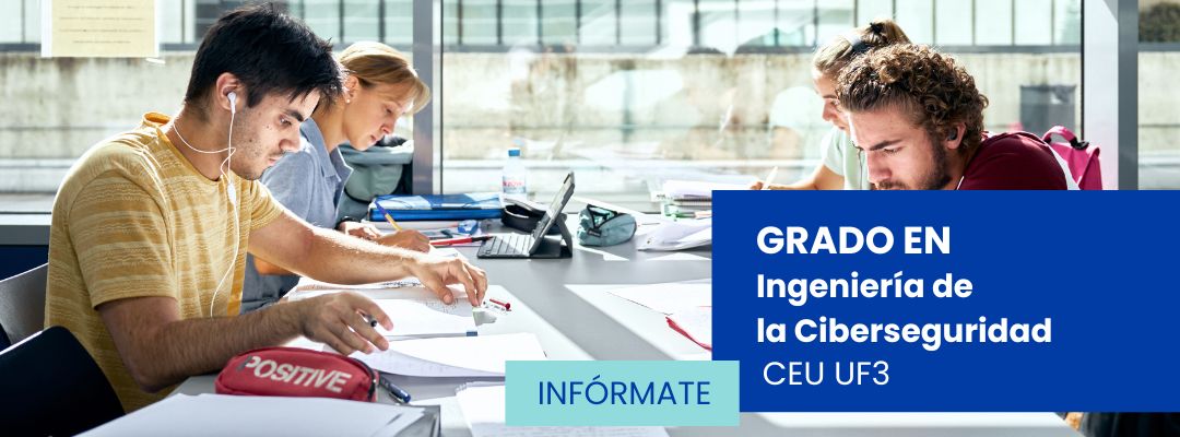 Grupo de estudiantes del grado en Ingeniería de la Ciberseguridad sentados en una sala de estudio, concentrados frente a sus portátiles y apuntes, colaborando en silencio mientras revisan código y materiales académicos en un entorno iluminado y ordenado.